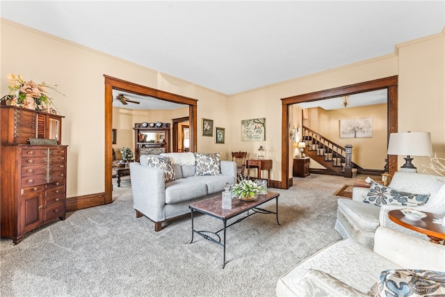 carpeted living room with ornamental molding