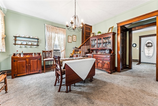 carpeted dining space featuring an inviting chandelier