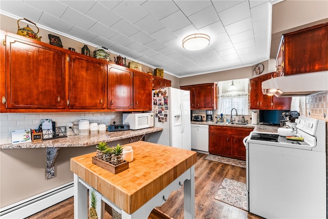 kitchen featuring dark hardwood / wood-style floors, exhaust hood, sink, a baseboard radiator, and white appliances