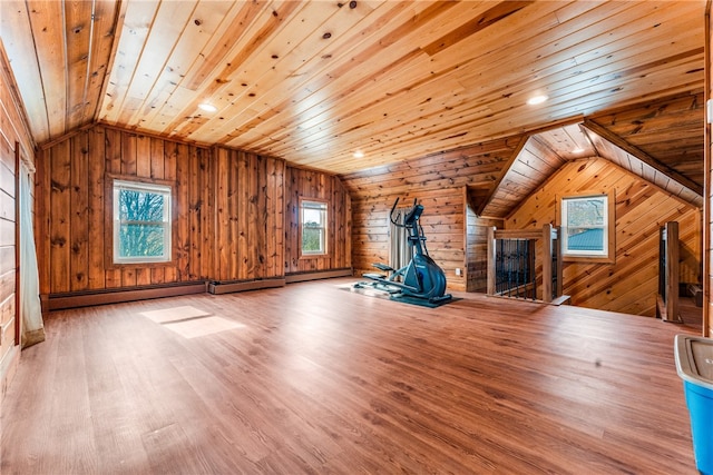 bonus room with wood walls, hardwood / wood-style floors, a healthy amount of sunlight, and wooden ceiling