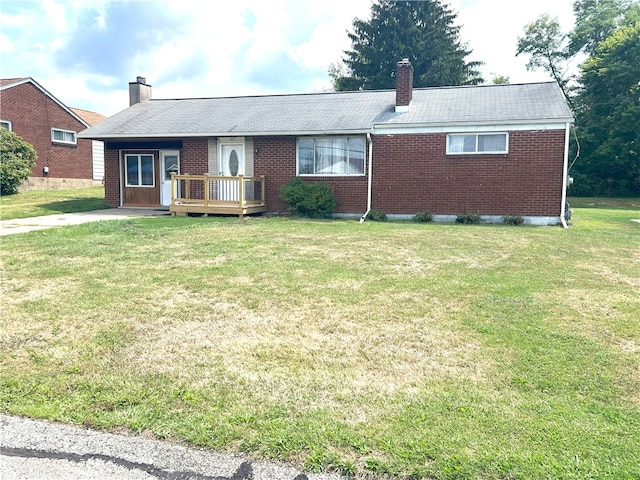 ranch-style home with a front yard