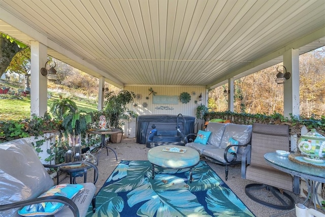 view of patio / terrace featuring a hot tub