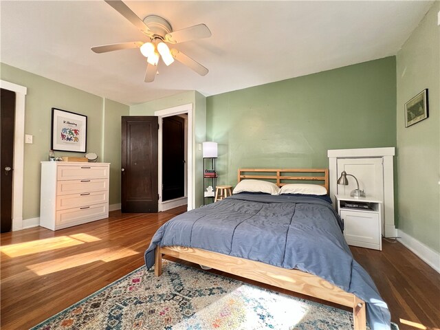 bedroom featuring ceiling fan and wood-type flooring