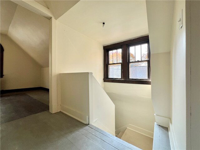 stairs with lofted ceiling