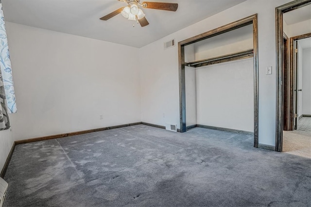 unfurnished bedroom with carpet floors, a closet, and ceiling fan