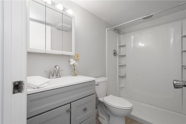 full bathroom featuring vanity, toilet, and shower / bath combination