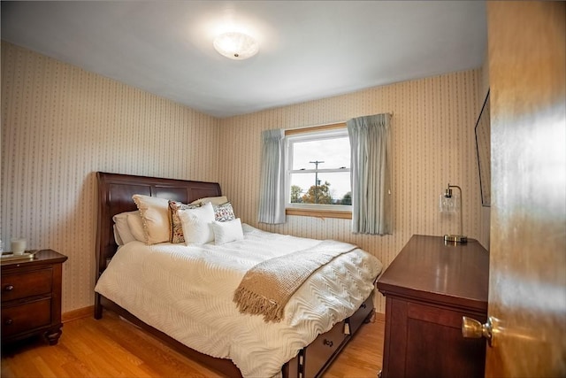 bedroom with light wood-type flooring