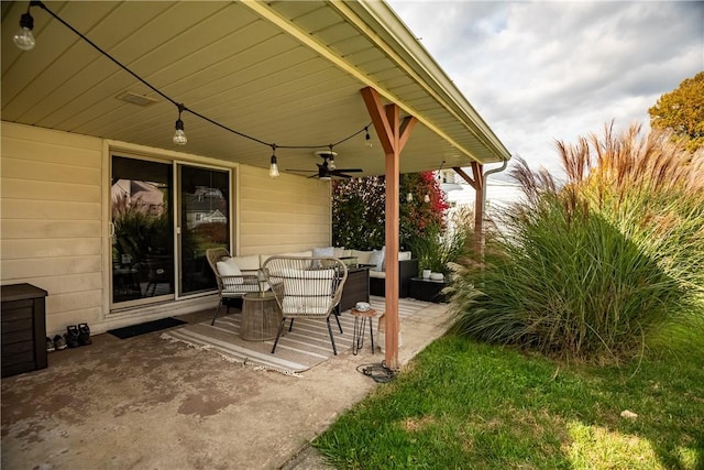 view of patio featuring an outdoor living space and ceiling fan