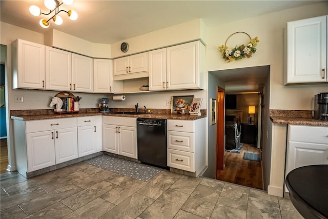 kitchen with sink, a notable chandelier, dishwasher, hardwood / wood-style floors, and white cabinetry