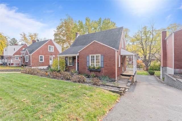 view of front of home with a front yard