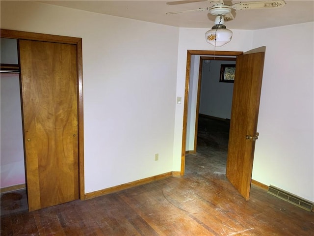 561 Williams Ave, Rochester Twp, PA 15074 - unfurnished bedroom featuring wood finished floors, a closet, and a ceiling fan
