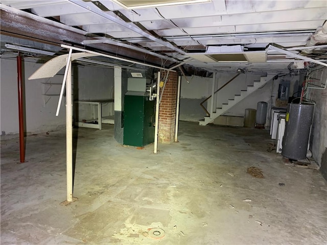 561 Williams Ave, Rochester Twp, PA 15074 - unfinished basement with water heater, stairway, and heating unit