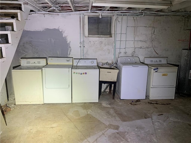 561 Williams Ave, Rochester Twp, PA 15074 - laundry area with washer and clothes dryer and water heater