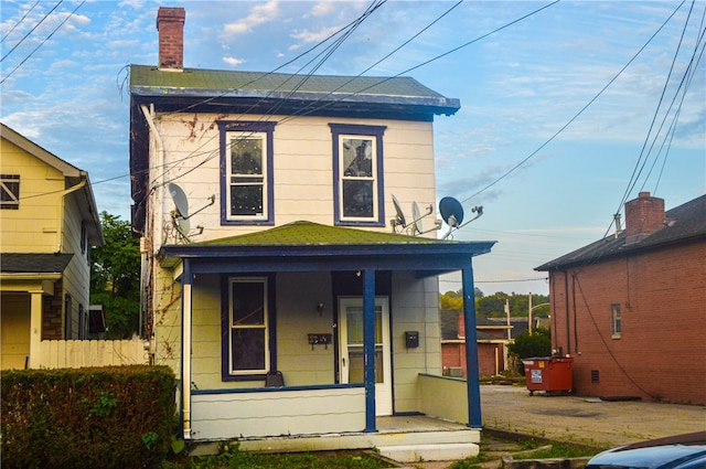 bungalow-style house featuring covered porch