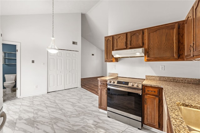 kitchen with high vaulted ceiling, decorative light fixtures, light wood-type flooring, and stainless steel electric range oven