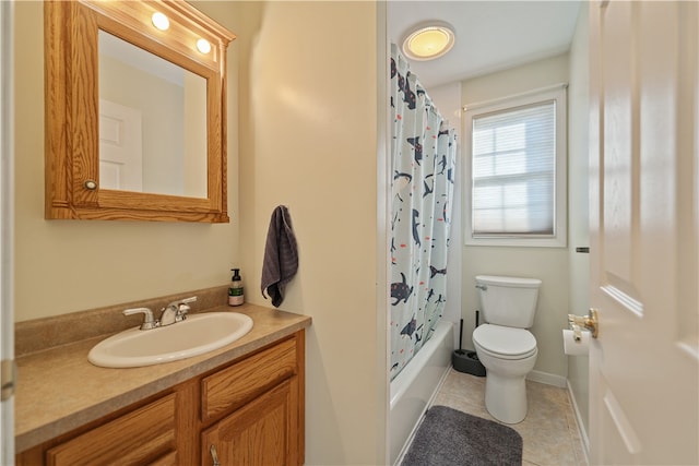 full bathroom with tile patterned flooring, vanity, shower / tub combo, and toilet