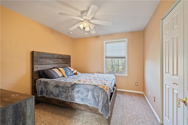 carpeted bedroom with ceiling fan