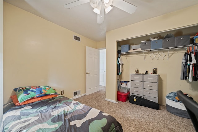 bedroom with carpet floors, a closet, and ceiling fan