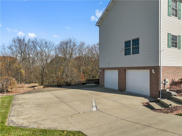 view of home's exterior featuring a garage