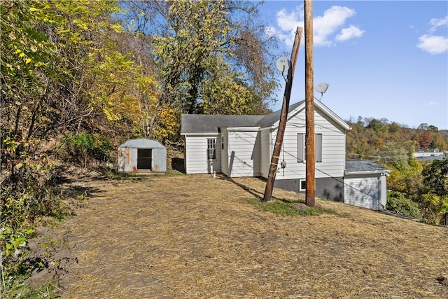 exterior space featuring a storage shed