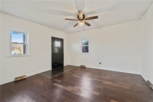 foyer featuring ceiling fan and dark hardwood / wood-style flooring