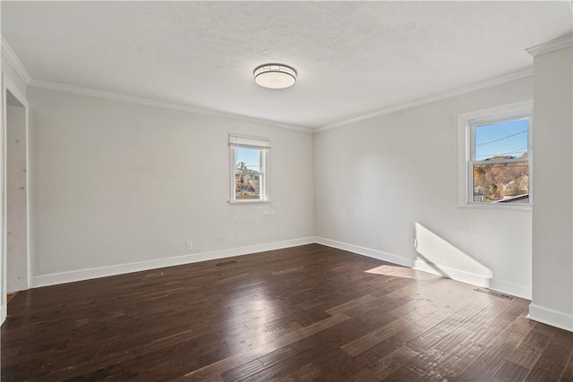 unfurnished room featuring ornamental molding, dark hardwood / wood-style floors, and a healthy amount of sunlight