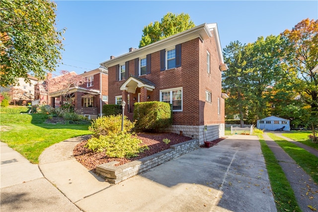 view of front of home with a front yard