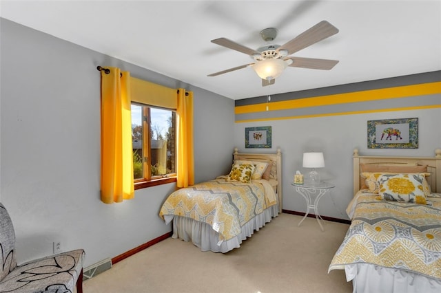 bedroom with light colored carpet and ceiling fan