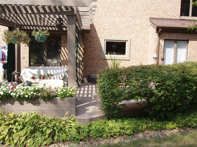 exterior space featuring a pergola