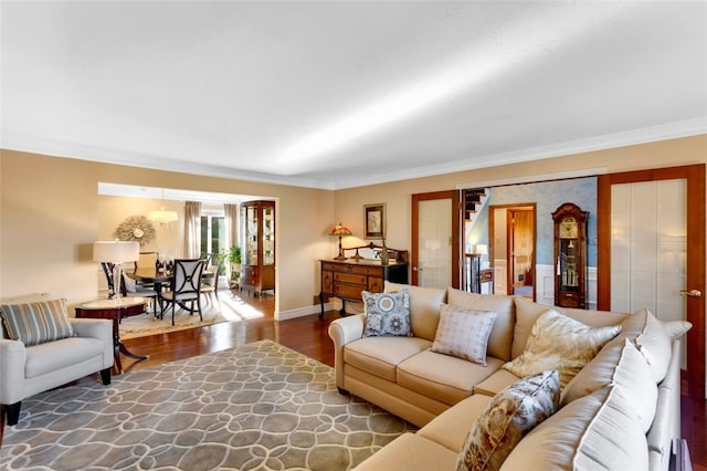 living room featuring ornamental molding and hardwood / wood-style floors