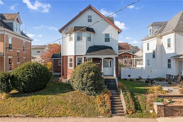 view of front of home featuring a front lawn