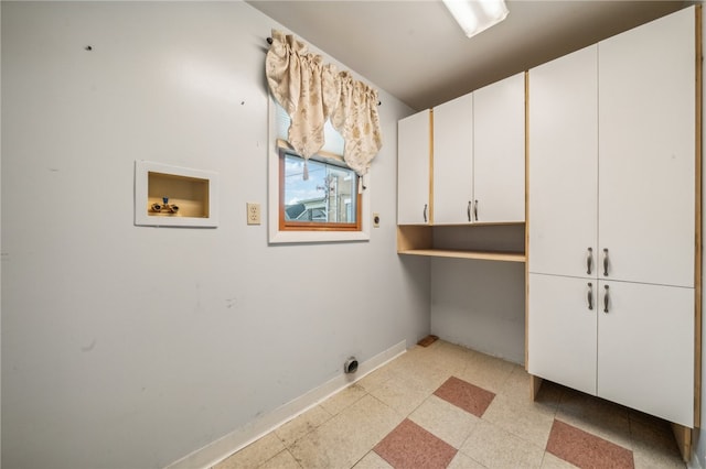 laundry area with cabinets, hookup for a washing machine, and electric dryer hookup