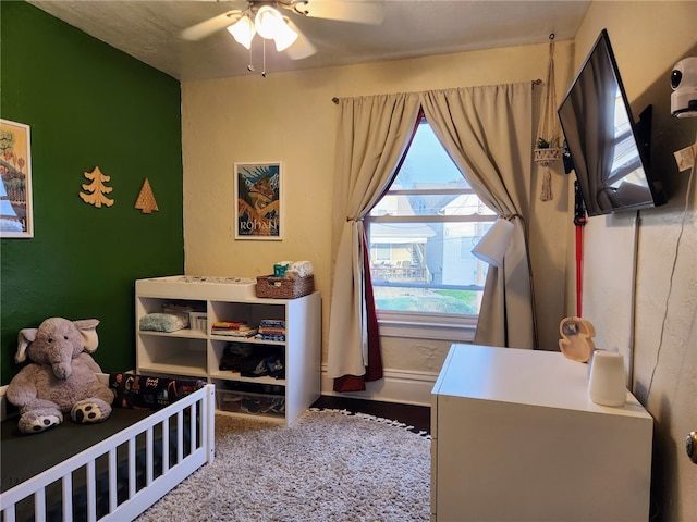 bedroom featuring carpet flooring and ceiling fan