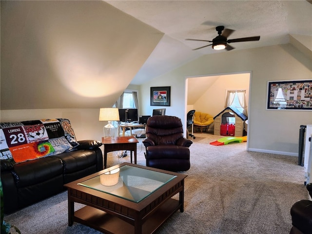 carpeted living room featuring vaulted ceiling and ceiling fan