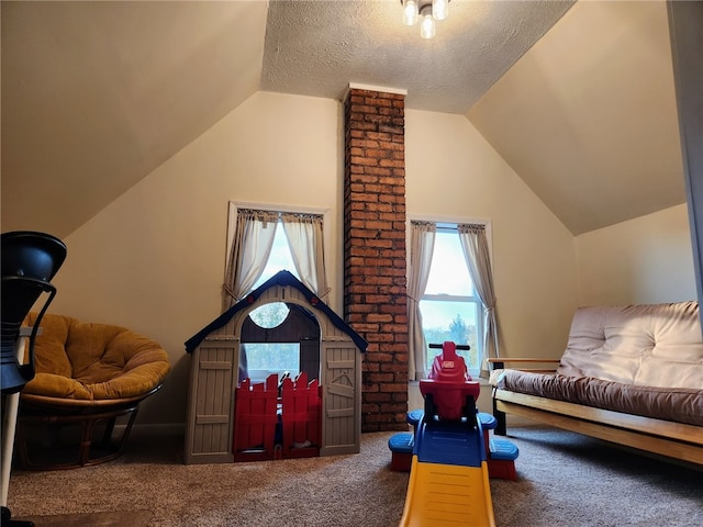 interior space with lofted ceiling, multiple windows, and carpet flooring