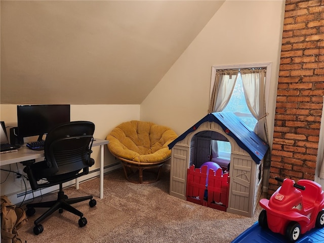 home office with lofted ceiling and carpet floors