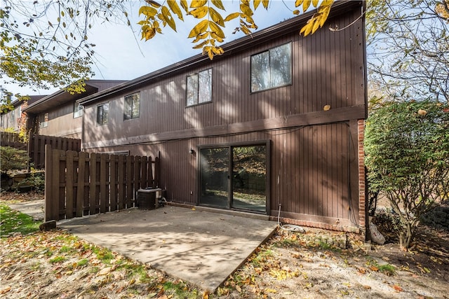 rear view of property featuring a patio area