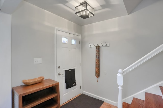 view of tiled foyer entrance