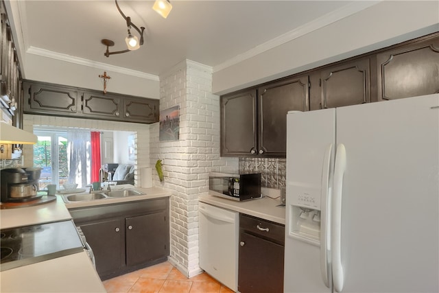 kitchen featuring ornamental molding, sink, dark brown cabinetry, light tile patterned floors, and white appliances