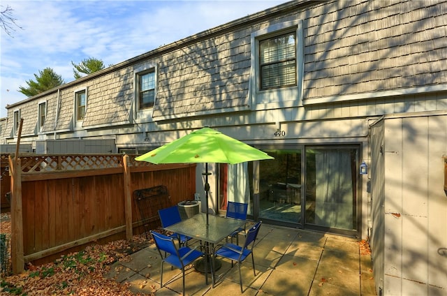 rear view of property with a patio