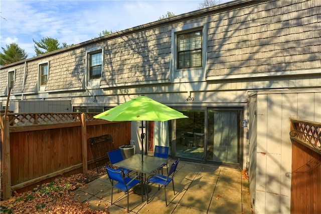 back of house featuring a patio area