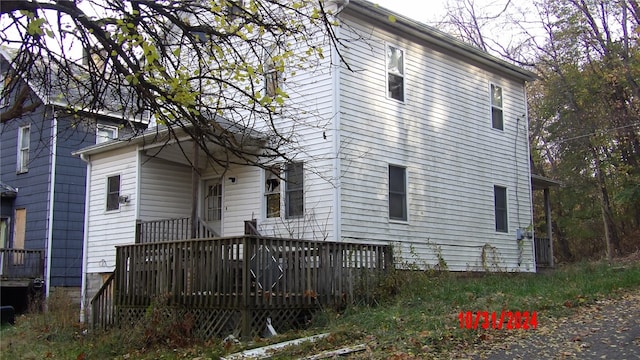 view of front of property with a deck