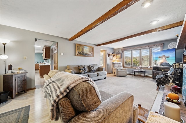 living room featuring beam ceiling and light wood-type flooring