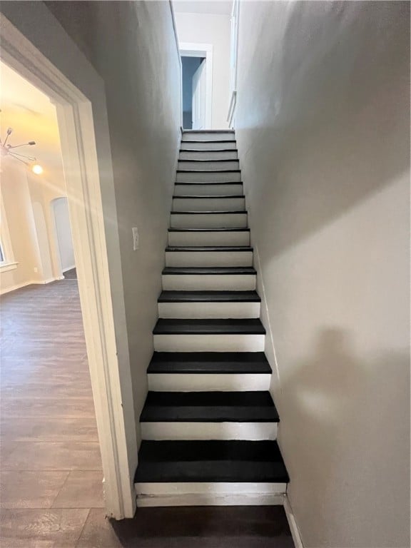 stairway with wood-type flooring