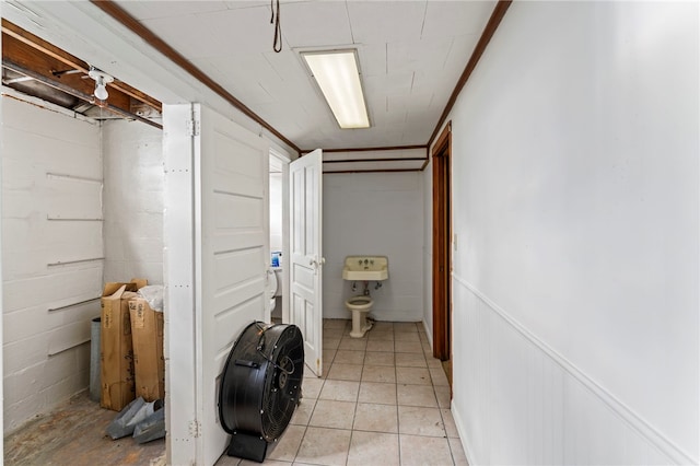 interior space with crown molding