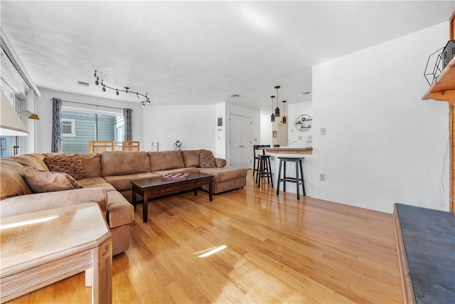 living room featuring light hardwood / wood-style floors