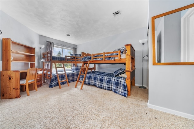 bedroom featuring carpet flooring