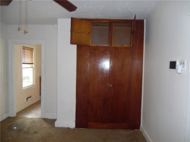 corridor with concrete floors