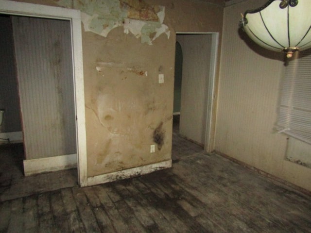 interior space with dark hardwood / wood-style flooring