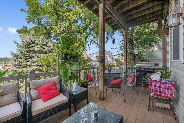 wooden terrace with area for grilling